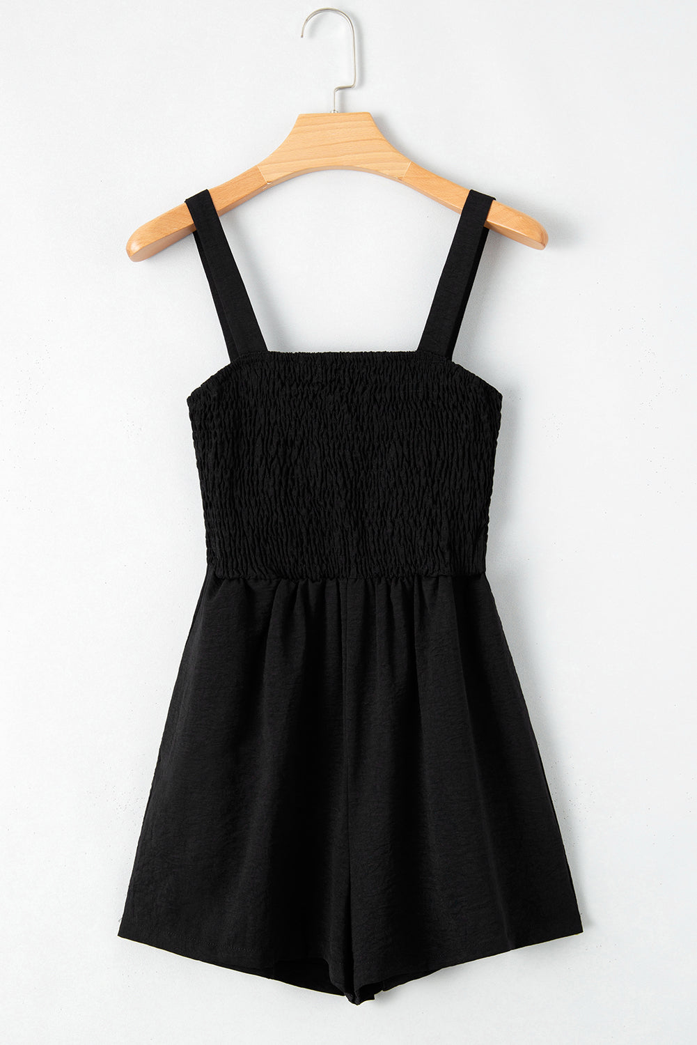 Black Casual Pocketed Smocked Sleeveless RomperMaterial:100%Polyester

• This romper is a versatile wardrobe staple that effortlessly combines comfort and style. 
• Crafted with high-quality fabric, this romper