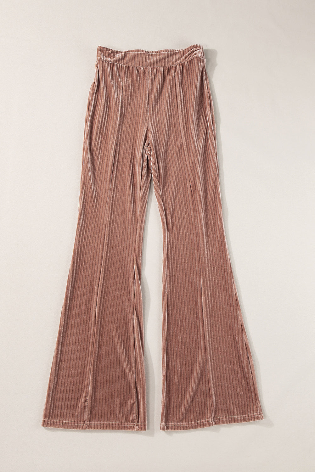 Chestnut Solid Color High Waist Corduroy Flare PantsMaterial:90%Polyester+10%Elastane



		These pants feature a high waist design, which offers a flattering silhouette and can make the wearer's legs appear longer. 