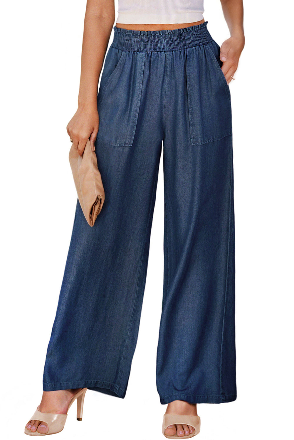 Sail Blue Side Pockets Frilled Smocked High Waist Wide Leg JeansMaterial:100%Lyocell

• Embrace a seaside vibe with these jeans featuring side pockets for practicality and frilled detailing for a touch of playful charm.
• Eleva