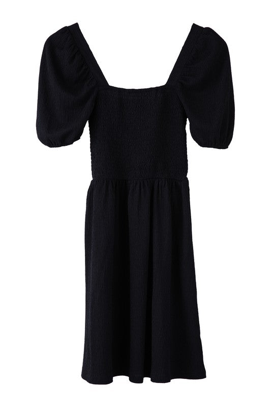 Puff sleeved smocked dress- Puff sleeved smocked dress- Pattern type : solid- Neck line : square neck- Sleeve type : puff sleeves- Sleeve length : short sleeves- Stretch : stretch- Sheer : no