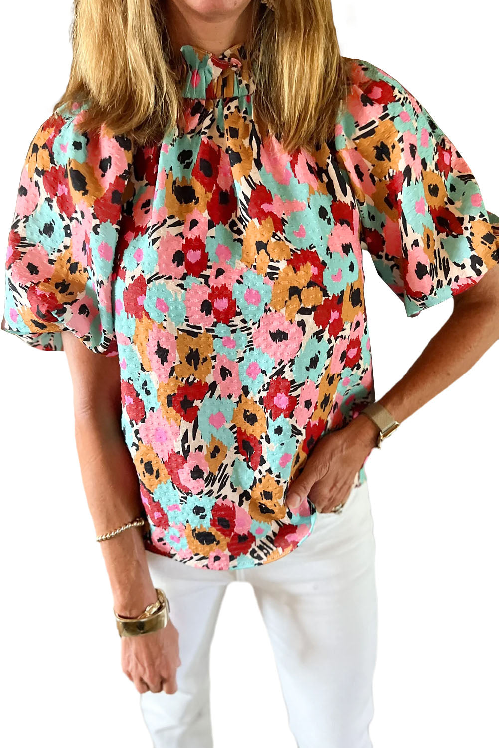 White Frilled Floral Print Puff Sleeve Mock Neck BlouseMaterial:100%Polyester



		The blouse features a frilled hem, adding a feminine and playful touch to the overall silhouette. 
	
	
		Pair it with jeans and flat