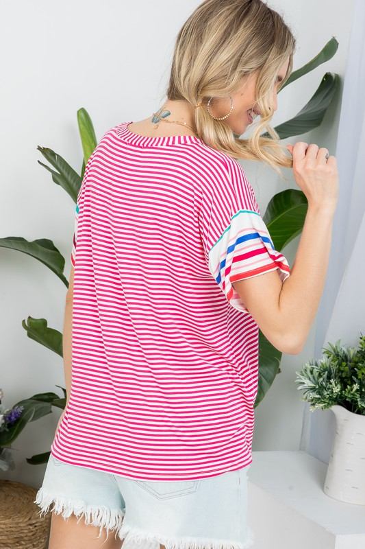 MULTI STRIPE BOXY TOP- Multi stripe boxy top- Pullover short sleeves- V neck chest pocket- Multi stripe jersey - Model is 5' 8" 34-24-34 and wearing a Small- S/M/L 2-2-2- 95% RAYON, 5% S