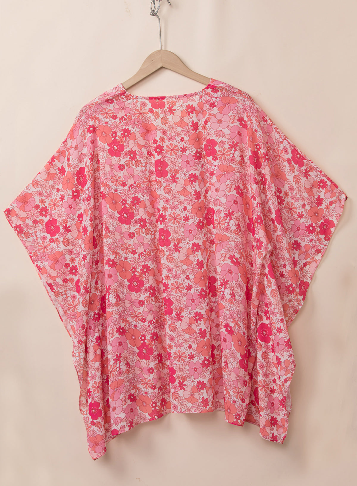 Pink Boho Floral Print V Neck Oversized BlouseMaterial:100%Polyester



		This oversized blouse is not only cool and comfortable but also suitable for any figure, making it a versatile choice for various body 