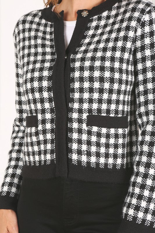 Black check knitted jacket- Black check knitted jacket, heavy weight fabric, 4 snap buttons, 2 functional pockets- Pattern type : check pattern- Neck line : round neck- Sleeve type : regular 