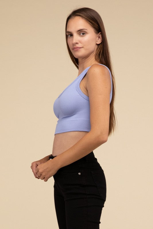 Ribbed Seamless Crop TopElevate your summer essentials with our Ribbed Seamless Crop Top, a versatile piece perfect for layering or wearing solo. Crafted with comfort in mind, it boasts a f