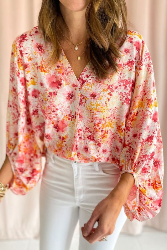 Pink Floral Print V-Neck Lantern Sleeve BlouseMaterial:100%Polyester

• Embrace elegance in this blouse, perfect for adding a touch of femininity to your wardrobe.
• The boho floral print exudes a charming and