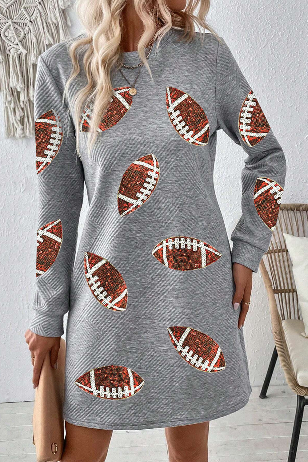 Gray Sequin Rugby Graphic Round Neck Textured Mini DressMaterial:97%Polyester+3%Elastane

• Shimmer and shine in the dress, perfect for adding a touch of glamour to your wardrobe. 
• With its long sleeves and round neck