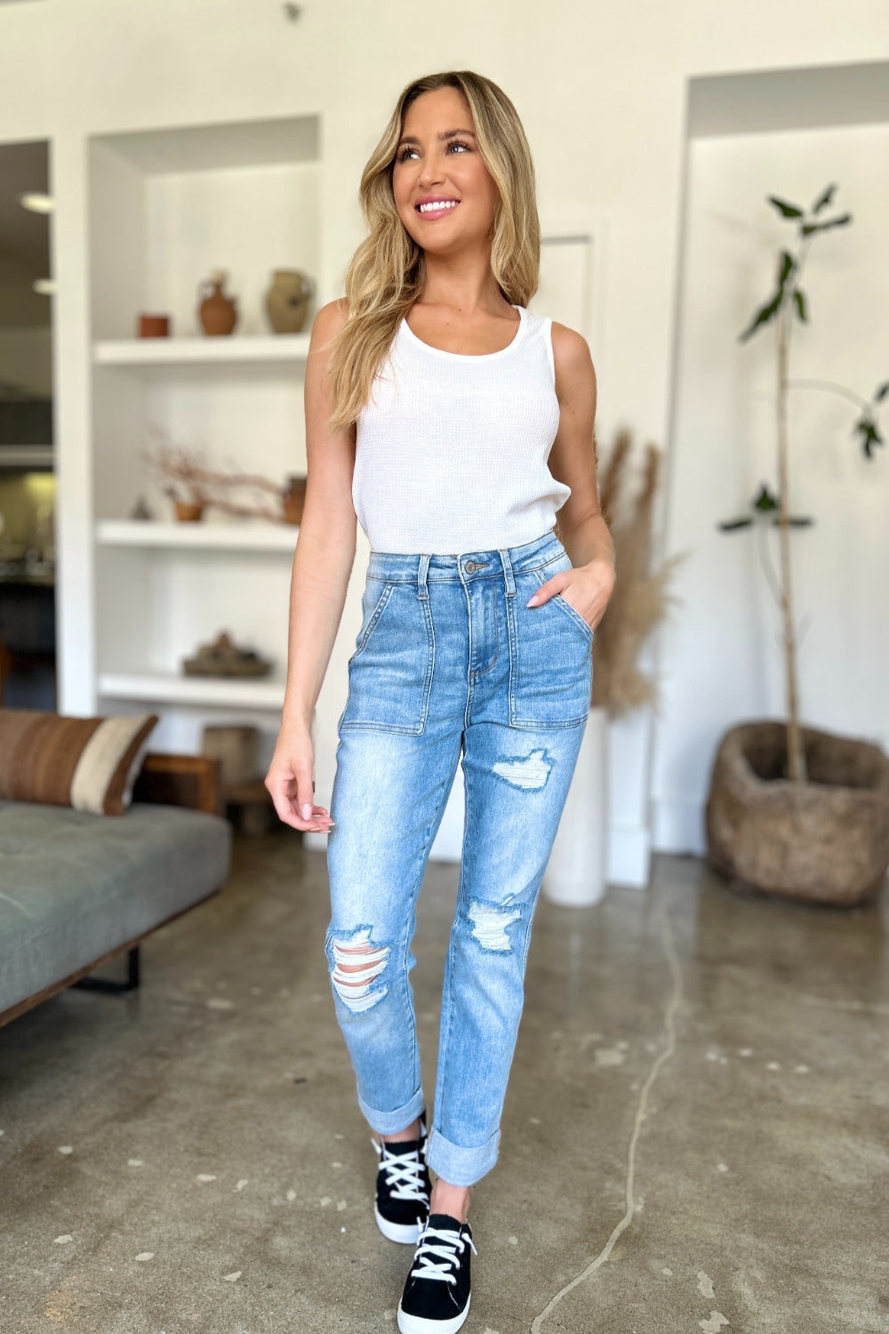 Judy Blue Full Size Distressed Straight Jeans with Patch PocketsThese distressed straight jeans feature stylish patch pockets for added flair. The distressed detailing adds a trendy touch to your look. The straight cut offers a f