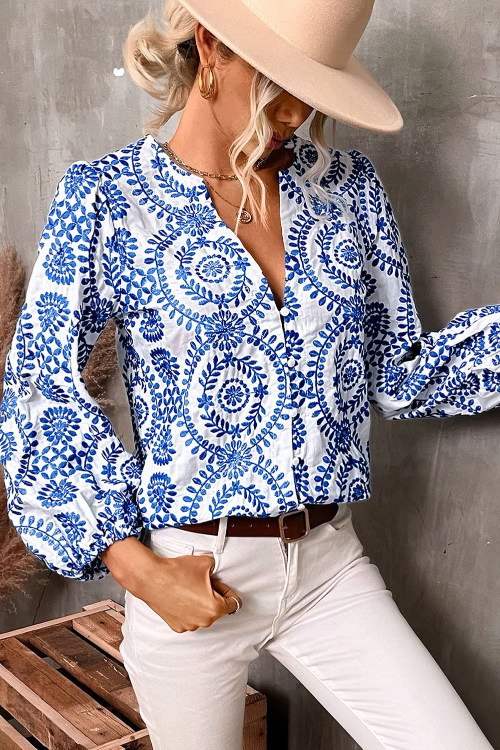 Sky Blue Embroidered V Neck Puff Sleeve Boho BlouseMaterial:100%Polyester

• Exude bohemian charm with this blouse featuring intricate floral embroidery and delicate puff sleeves. Perfect for a whimsical and romanti