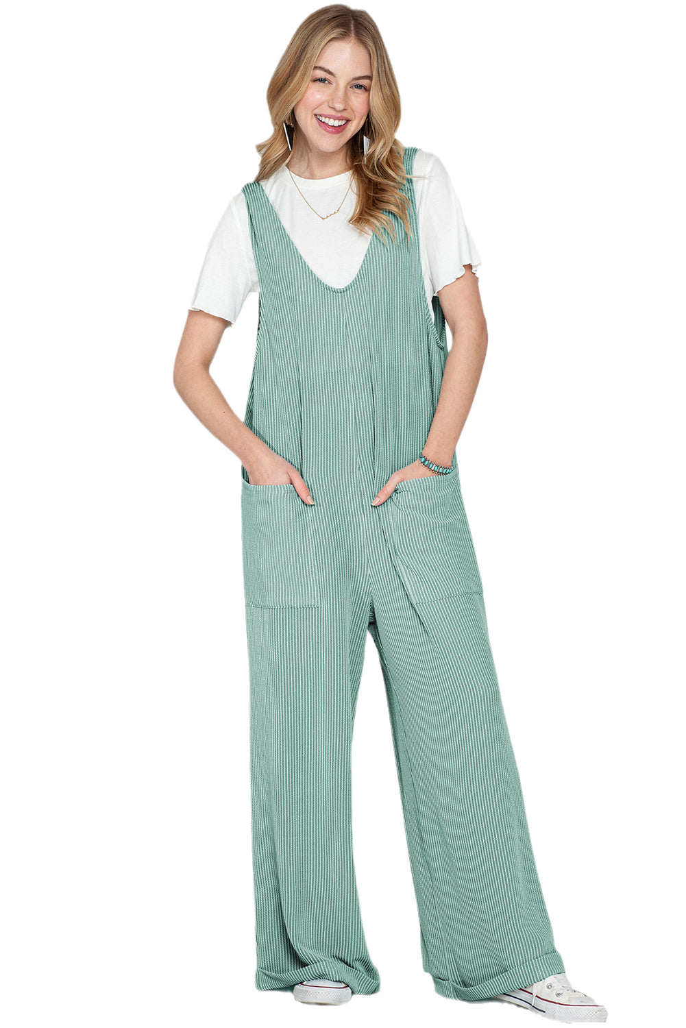 Parchment Pockets Oversized Ribbed Wide Leg JumpsuitMaterial:75％Polyester+20％Viscose+5％Elastane



		The jumpsuit is colored in a vibrant shade, adding a pop of color to your outfit.
	
	
		It features an oversize