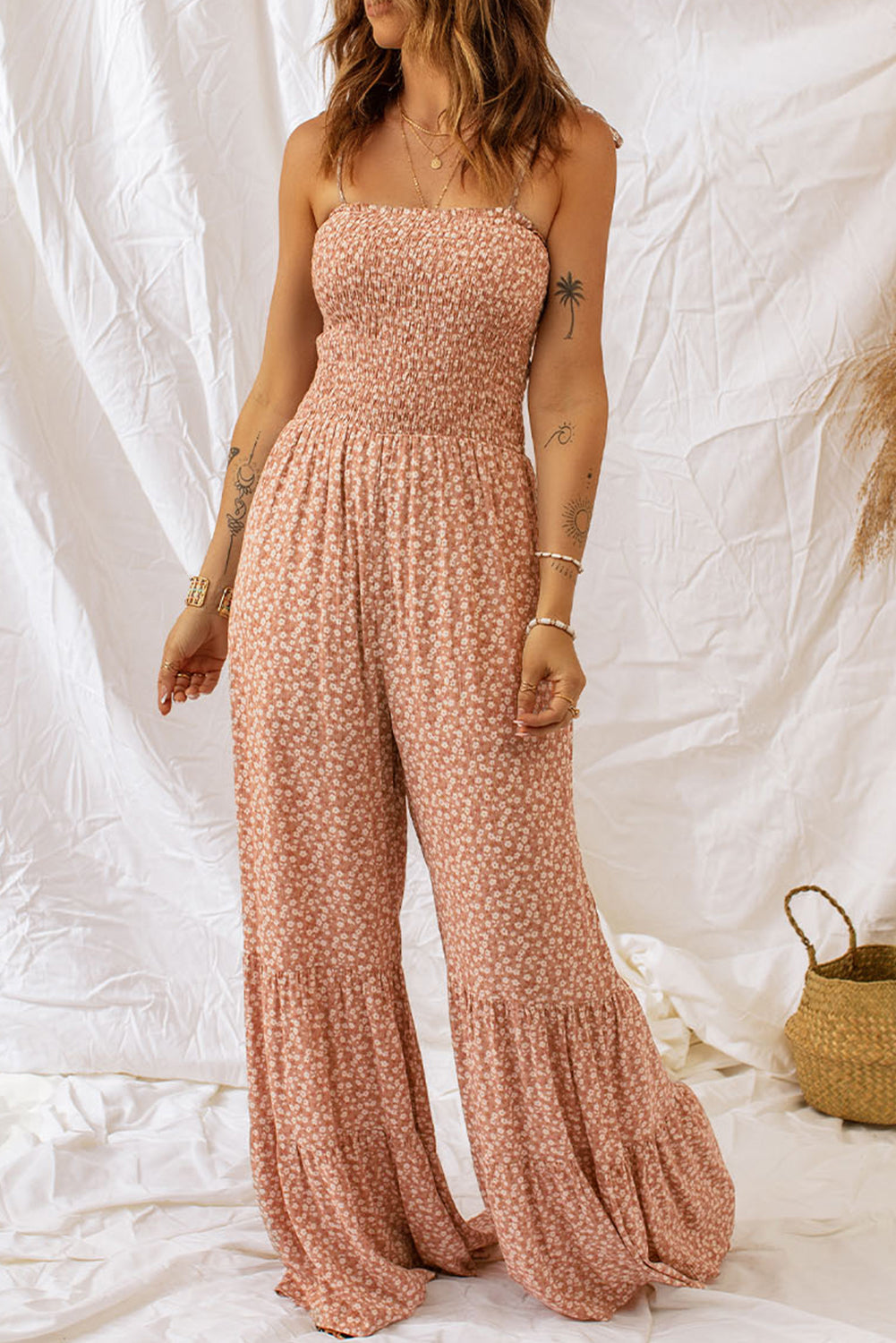 Khaki Floral Spaghetti Straps Smocked Bodice Wide Leg JumpsuitMaterial:100%Polyester



		Smoked bodice design highlights women’s
sexy body shapes.
	
	
	
		Floral jumpsuit with the wide leg is very
textured and fashiona