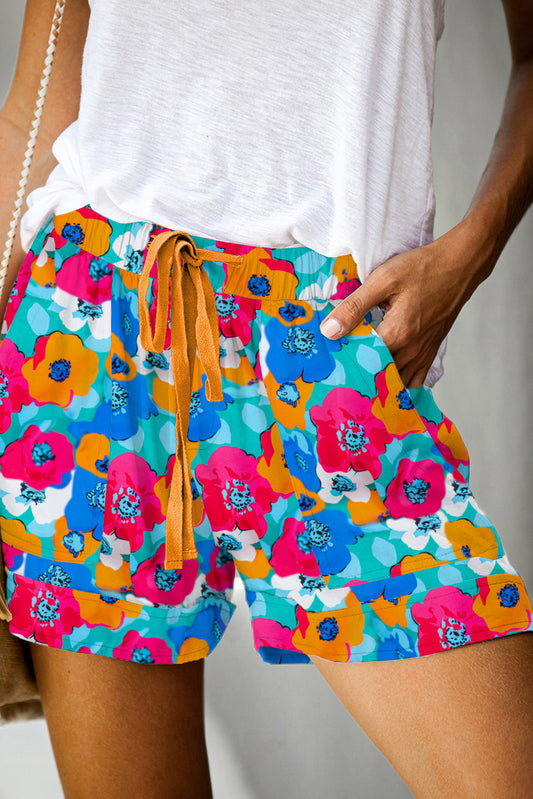 Multicolor Floral Print Drawstring Elastic Waist ShortsMaterial:100%Polyester



		The shorts are the perfect addition to any summer wardrobe, offering comfort and style in one chic package.
	
	
		With their vibrant