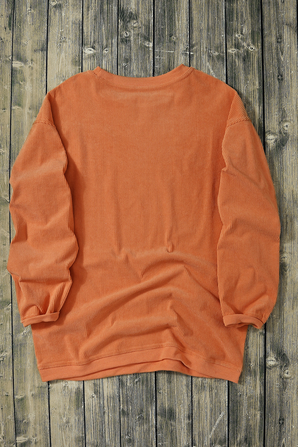 Orange Vols Letter Graphic Crinkle Ribbed Oversized SweatshirtMaterial:100%Polyester

• Vibrant orange hue adds a pop of color to your wardrobe, perfect for standing out in a crowd. 
• Oversized fit provides comfort and a rel