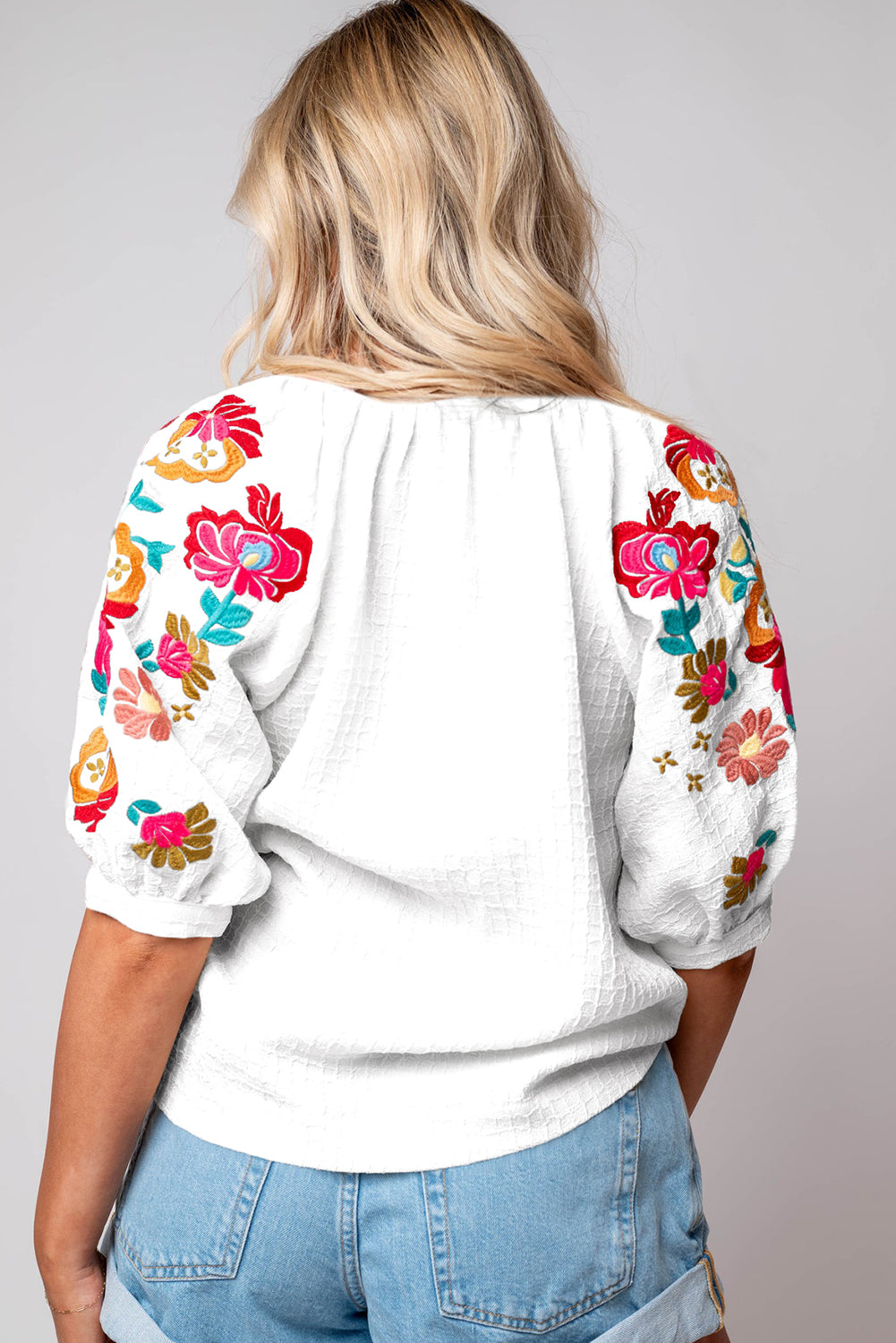 Black Floral Embroidered Ricrac Puff Sleeve Textured BlouseMaterial:100%Polyester

• Intricately detailed floral embroidery adds a touch of whimsy to the classic black hue, perfect for day-to-night transitions.
• The playf