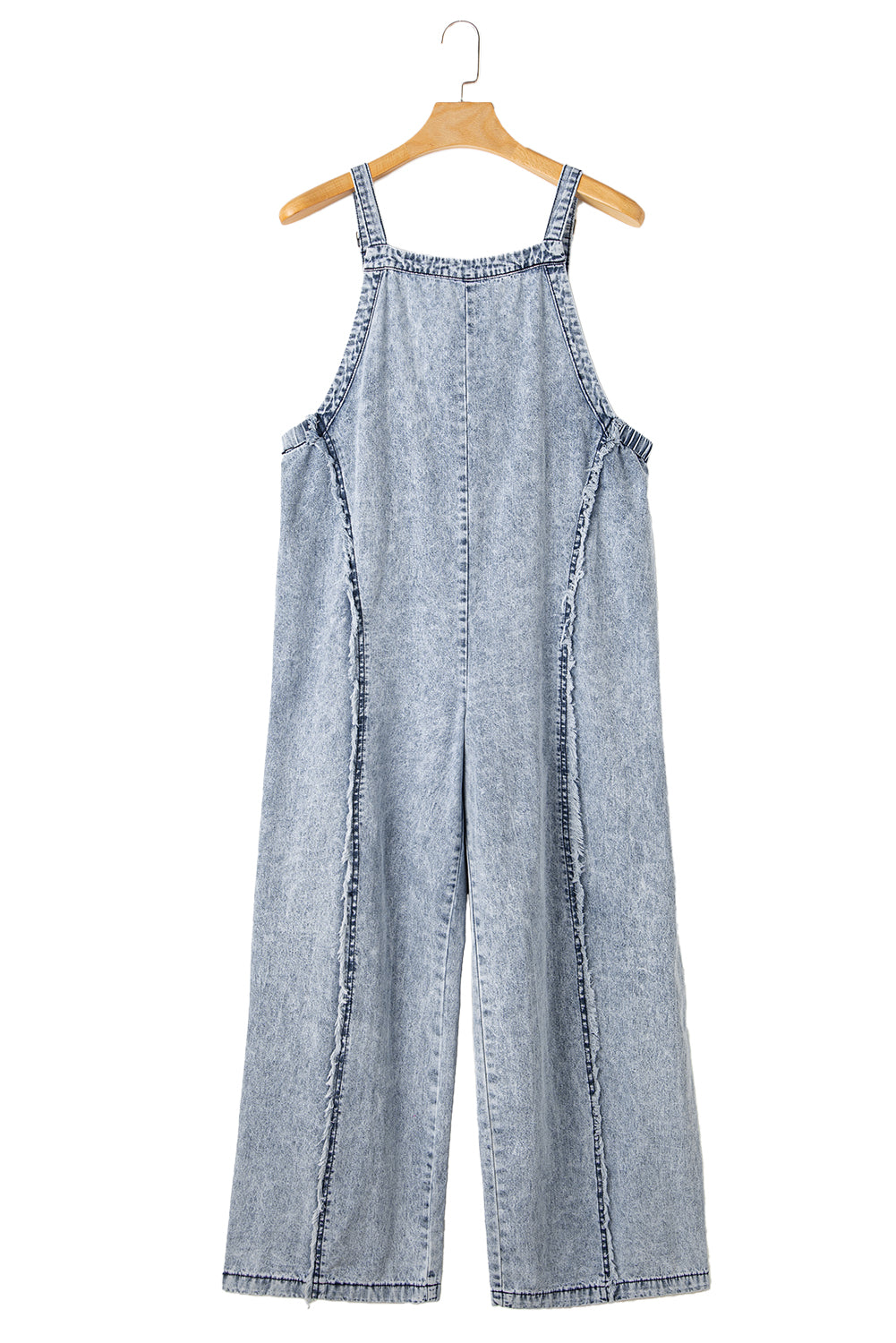 Blue Light Wash Frayed Exposed Seam Wide Leg Denim OverallsMaterial:95%Cotton+5%Polyester



		The overalls are a stylish and retro-inspired pair of overalls made from light wash denim.
	
	
		These overalls have a vinta