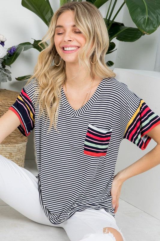 MULTI STRIPE BOXY TOP- Multi stripe boxy top- Pullover short sleeves- V neck chest pocket- Multi stripe jersey - Model is 5' 8" 34-24-34 and wearing a Small- S/M/L 2-2-2- 95% RAYON, 5% S