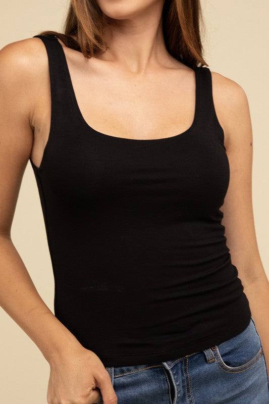 Double Layer Round Neck Tank TopThe Double Layer Round Neck Tank Top offers a stylish and comfortable option for any wardrobe. Featuring a classic round neckline and a unique double-layer design, t