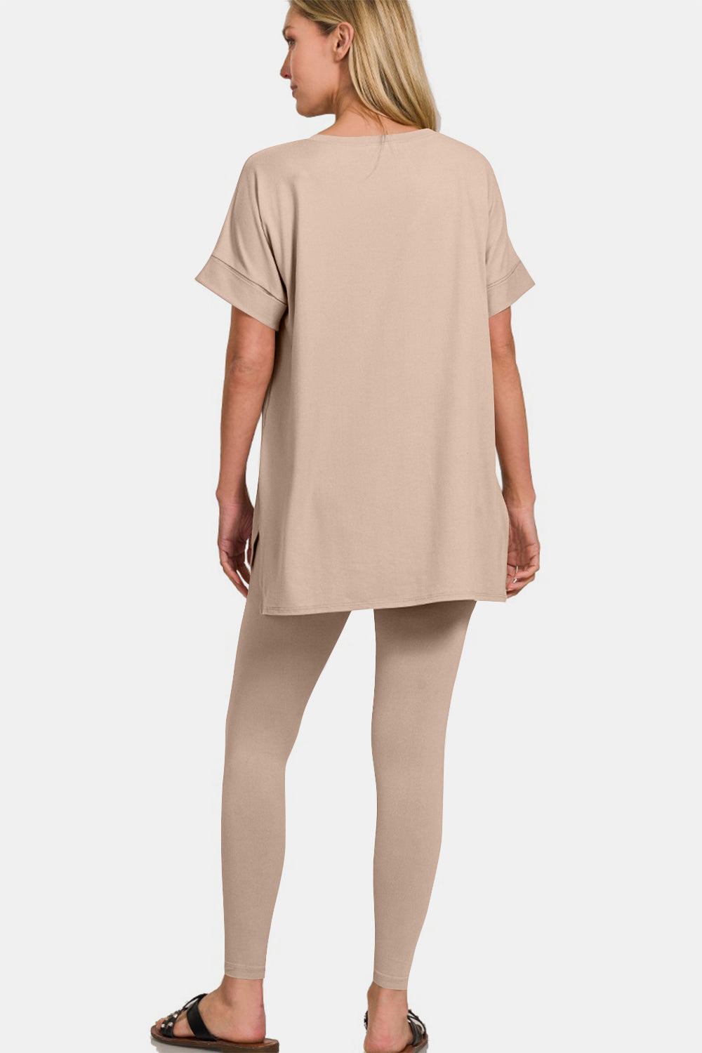 Zenana Full Size V-Neck Rolled Short Sleeve T-Shirt and Leggings LoungThe V-neck rolled short sleeve t-shirt and leggings lounge set offers the perfect blend of comfort and style for a laid-back day. The V-neck design adds a touch of s