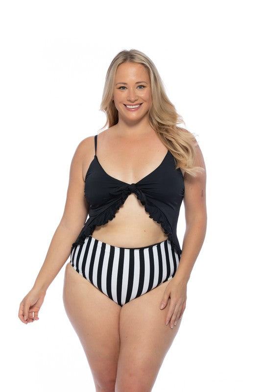 BLACK AND STRIPED CUTOUT ONE PIECE SWIMSUITBlack and striped contrast one piece swimsuit with ruffle trim, removable pads, adjustable shoulder straps, back hook closure, and cutout front look. Soft and stretc