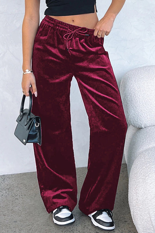 Burgundy Solid Drawstring Waist Wide Leg PantsMaterial:95%Polyester+5%Elastane

• Luxurious burgundy color adds a touch of sophistication to these wide-leg pants, suitable for both casual outings and formal eve