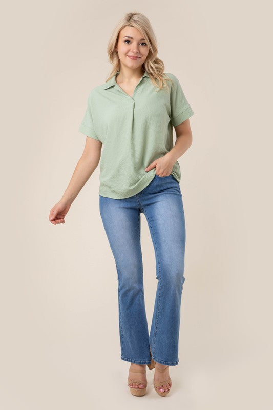 Shirt collared blouse- Shirt collared blouse- Pattern type : solid- Neck line : shirt collared- Sleeve type : regular sleeves- Sleeve length : short sleeves- Stretch : stretch- Sheer : n