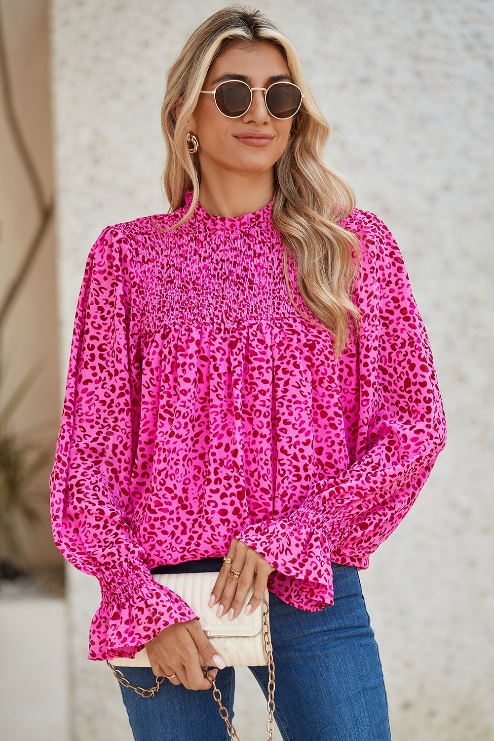 Rose Leopard Shirred Puff Sleeve Flowy BlouseMaterial:100%Polyester



		The blouse has a flowy silhouette, meaning it is loose and relaxed, draping away from the body. 
	
	
		The flowy silhouette of the b