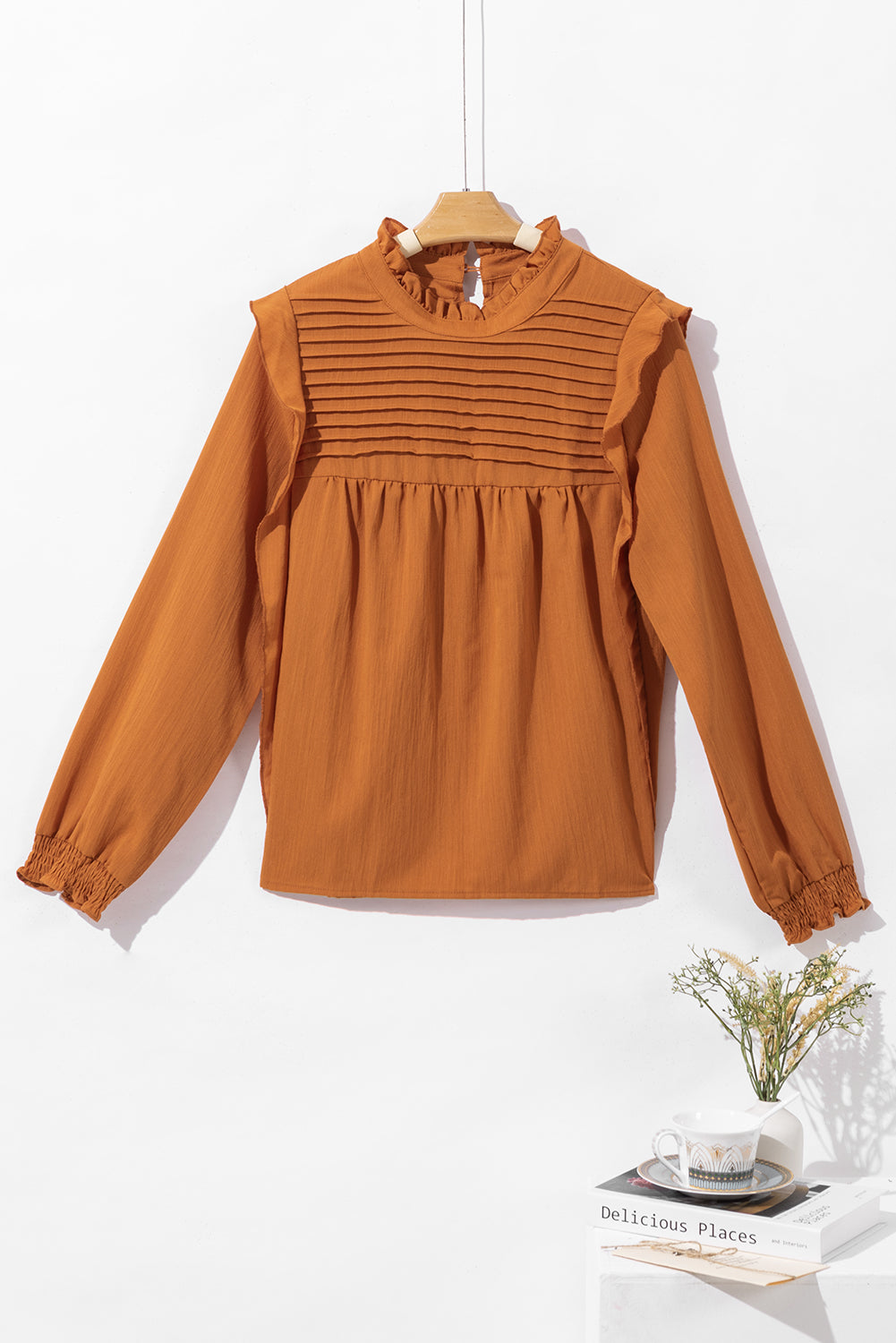 Camel Ruffle Solid Color Pleated Smocked Long Sleeve BlouseMaterial:50%Viscose+28%Polyester+22%Polyamide



		The blouse is made of high-quality fabric that is comfortable to wear and easy to maintain.
	
	
		The ruffled