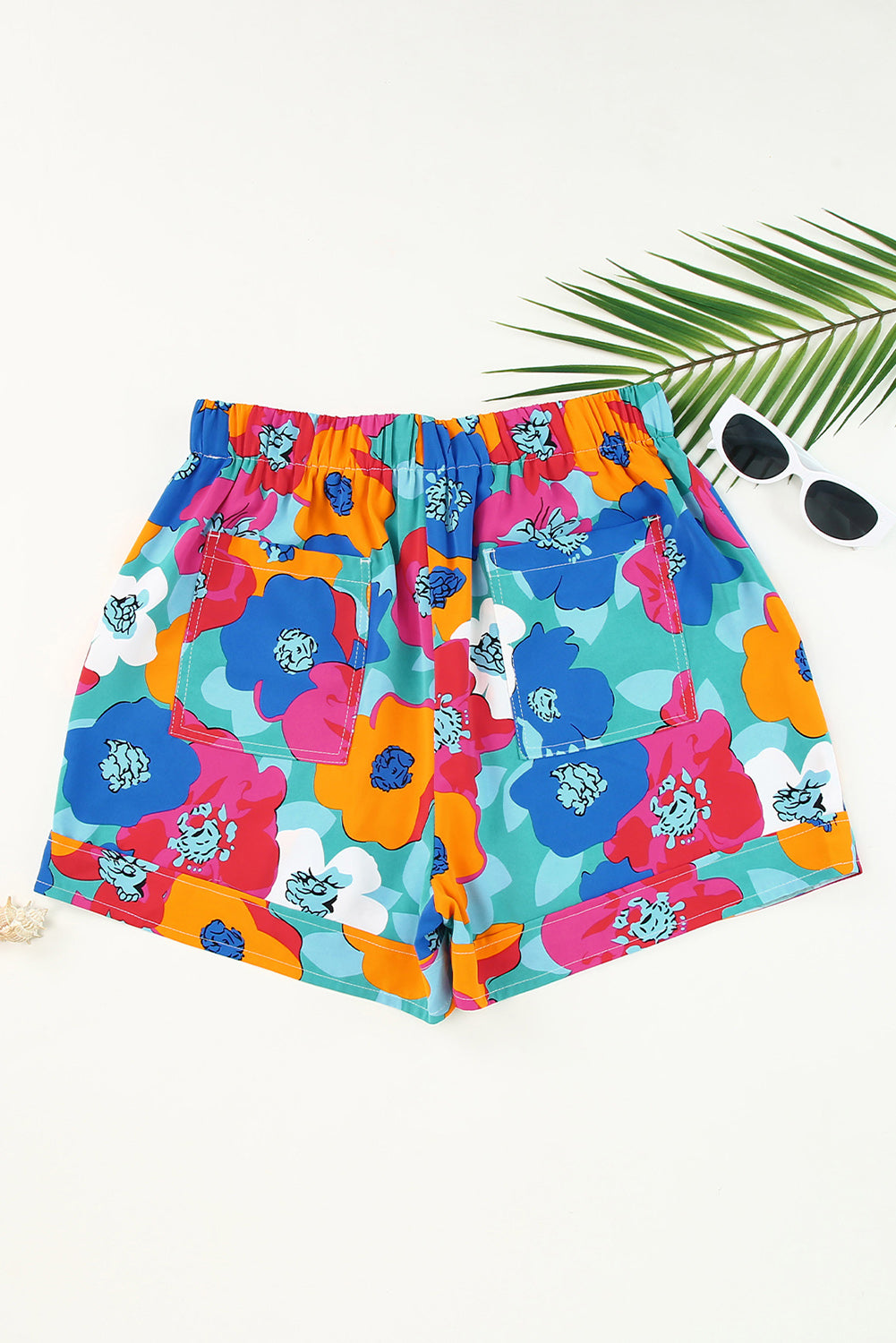 Multicolor Floral Print Drawstring Elastic Waist ShortsMaterial:100%Polyester



		The shorts are the perfect addition to any summer wardrobe, offering comfort and style in one chic package.
	
	
		With their vibrant