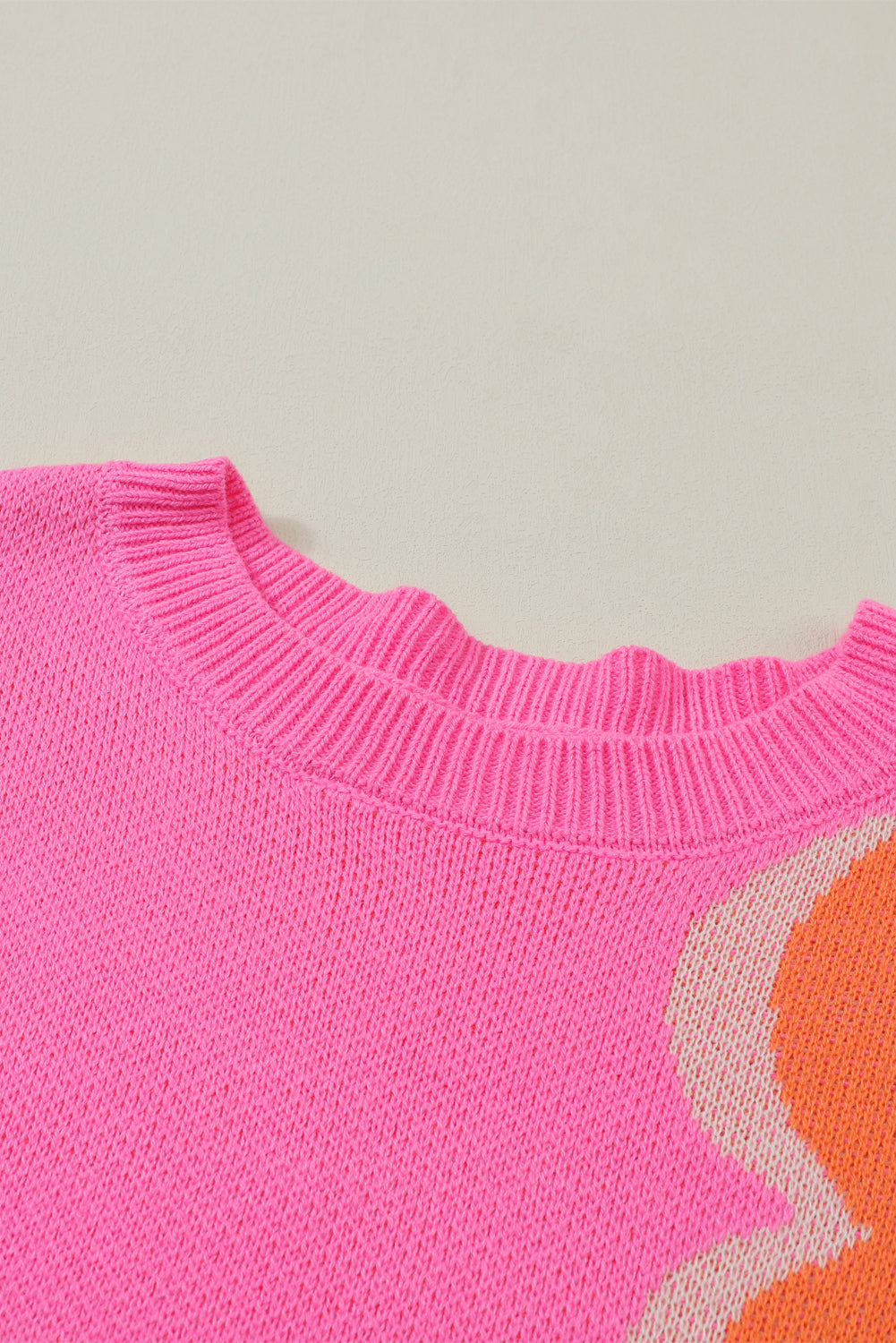 Pink & Orange 60s Floral Cable Knitted SweaterMaterial:100%Acrylic



		Add a pop of color and style to your wardrobe with our Pink &amp; Orange Floral Cable Knitted Sweater. This sweater features a vibrant fl