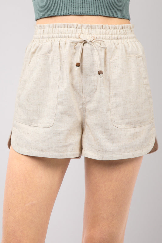 VERY J Drawstring Elastic Waist Linen ShortsStay cool and comfortable in these Elastic Waist Solid Linen Shorts featuring side pockets and a round hem for added style. These Cool Comfort Eco-Friendly Recycling