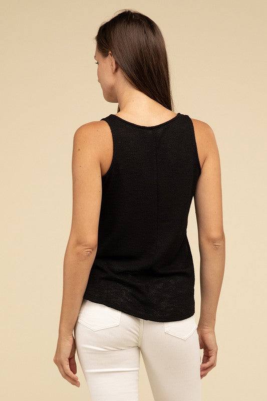 V Neck Sleeveless Cami TopThe V Neck Sleeveless Cami Top is a chic and versatile addition to any wardrobe. Featuring a flattering V neckline and a sleeveless design, this cami top is perfect 