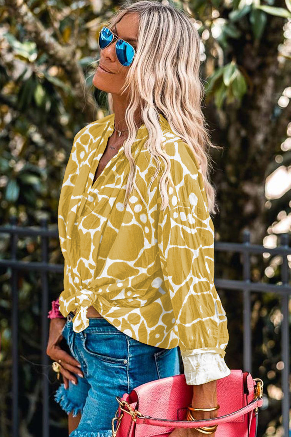 Ginger Abstract Floral Print V Neck BlouseMaterial:100%Cotton



		This blouse features an abstract floral print, which offers a modern and artistic interpretation of traditional floral patterns. 
	
	
	