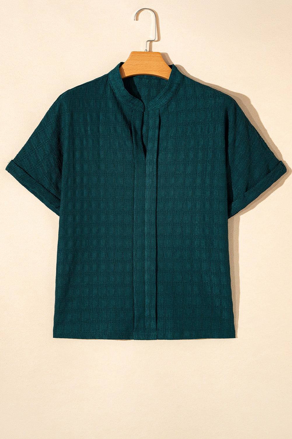 Sea Green Textured Split V-Neck Short Sleeve BlouseWith its flattering split V-neckline, this blouse adds a touch of elegance and sophistication to any outfit.
	
	
		The short sleeves provide a comfortable and bre