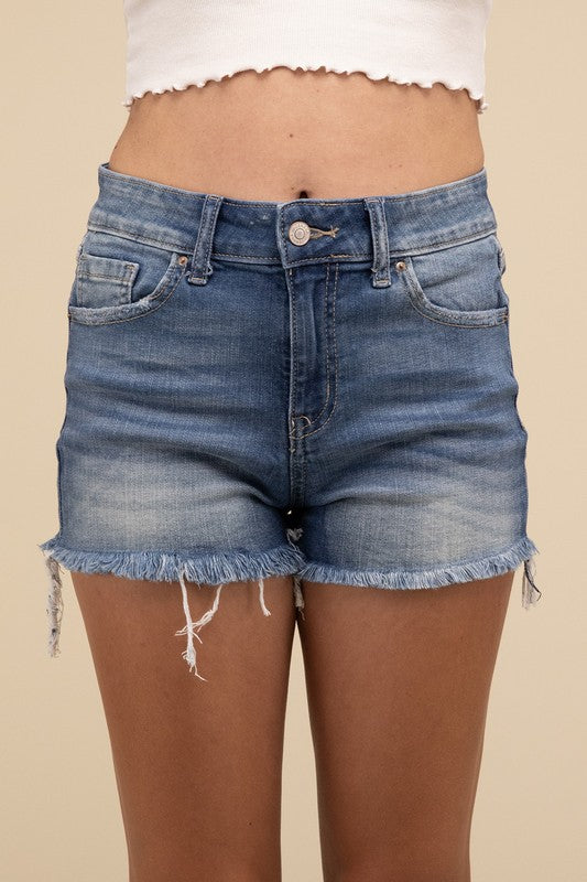 Mid Rise Raw Frayed Hem Denim ShortsOur Mid Rise Raw Frayed Hem Denim Shorts are crafted from stretch denim to ensure both style and comfort. The frayed hem adds a touch of casual charm, perfect for re