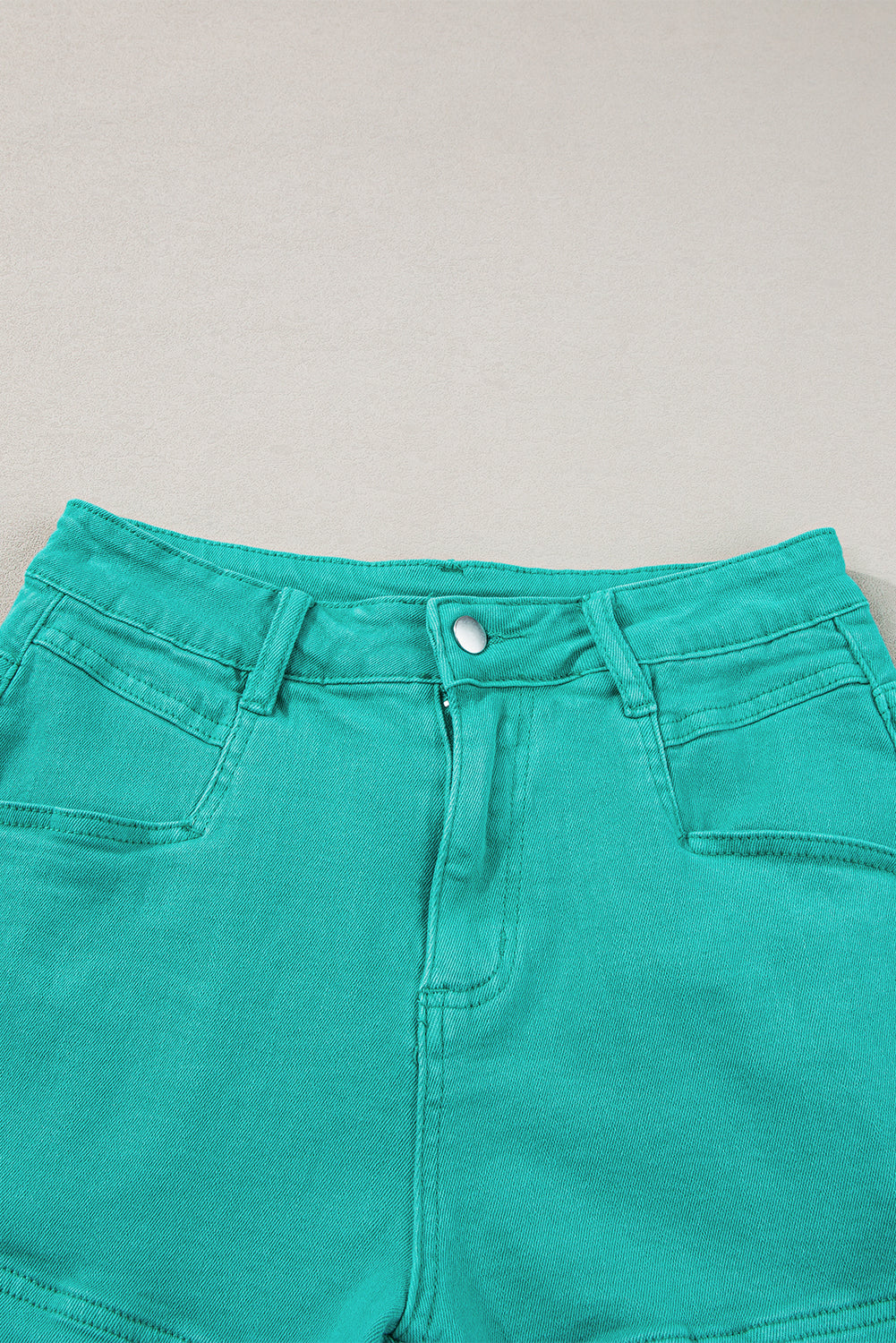 Turquoise Raw Hem Mid Rise Denim ShortsMaterial:98%Cotton+2%Elastane



		Discover a level of style that surpasses expectations with these denim shorts, offering a chic and fashionable look that goes be