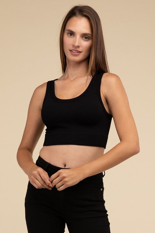 Ribbed Seamless Crop TopElevate your summer essentials with our Ribbed Seamless Crop Top, a versatile piece perfect for layering or wearing solo. Crafted with comfort in mind, it boasts a f