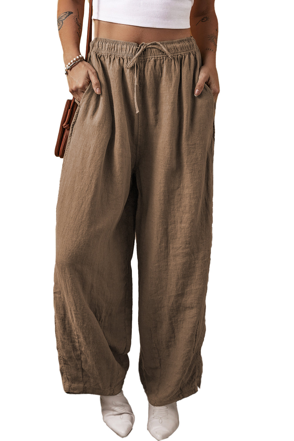 Desert Palm Cotton Linen Drawstring Waist Wide Leg PantsMaterial:50%Viscose+30%Linen+17%Polyester+3%Cotton

• The pants offer a chic and relaxed style perfect for daily wear, crafted from a blend of cotton and linen for 