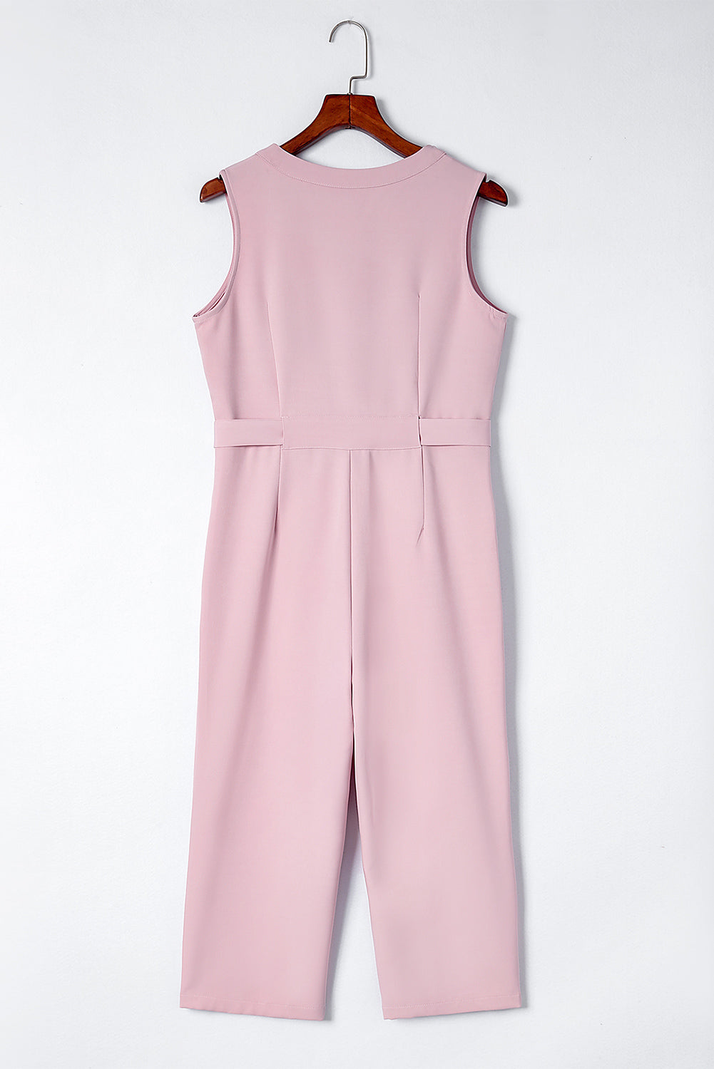 Pink Buttoned Sleeveless Cropped Jumpsuit With SashMaterial:95%POLYESTER+5%ELASTANE



		The
chic jumpsuit features a button-up front and a sleeveless design, making it
perfect for warm weather
	
	
		The
crop