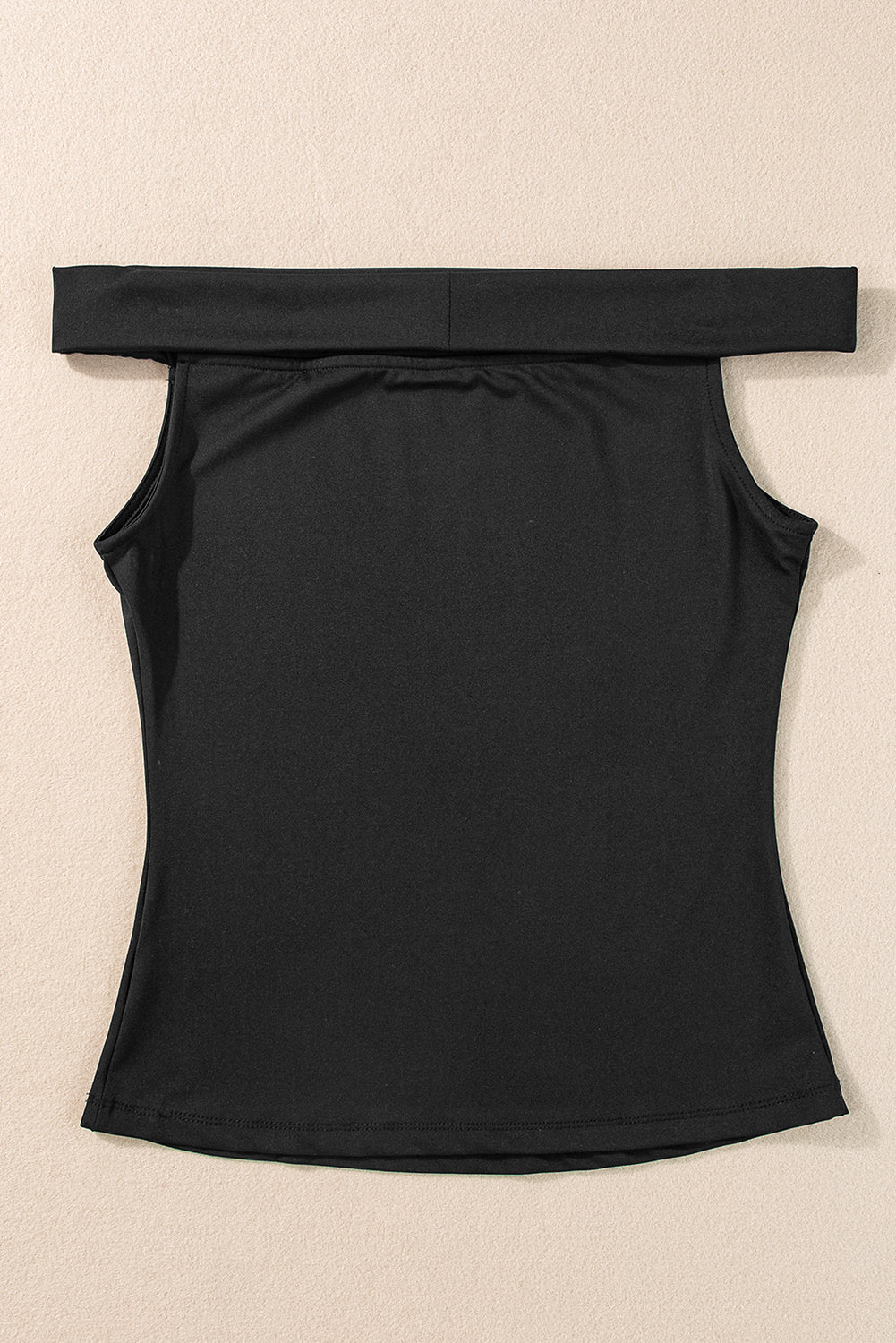 Black Solid Color Folded Off Shoulder Slim BlouseMaterial:92%Polyester+8%Elastane



		This trendy and flattering slim top is crafted to provide a fashionable and modern look, making it a versatile choice for var