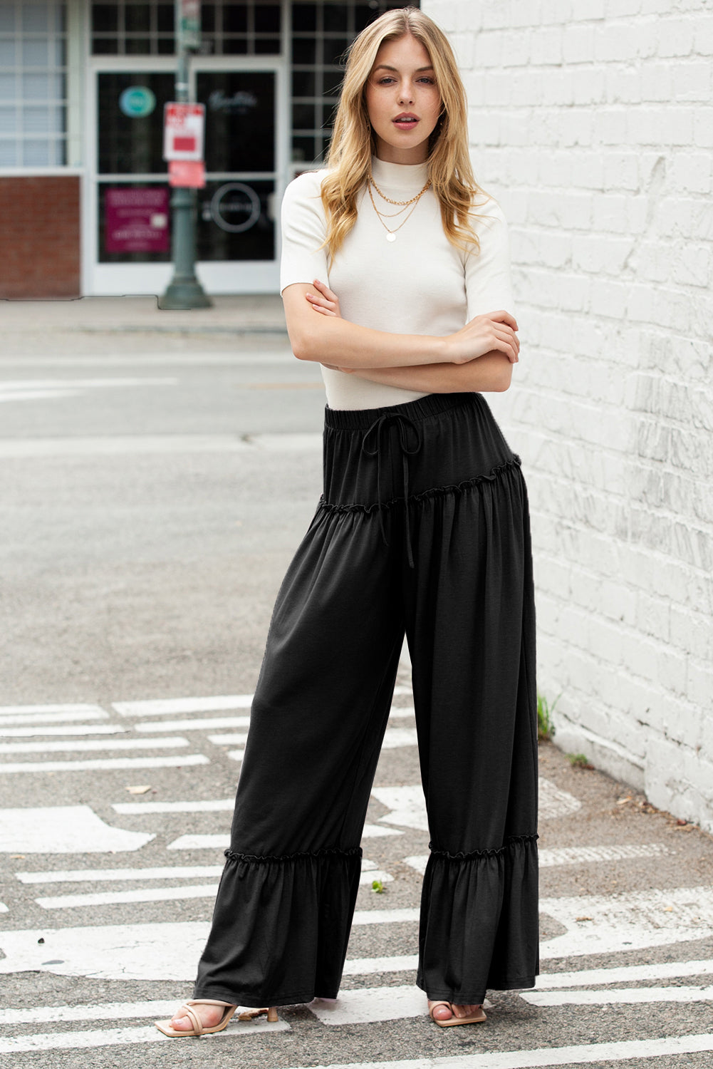 Black Frill Detail Drawstring High Waist Wide Leg PantsMaterial:65%Polyester+30%Viscose+5%Elastane



		Effortlessly stylish: Loose fit and wide leg design for a chic and contemporary look.
	
	
		Versatile and easy 