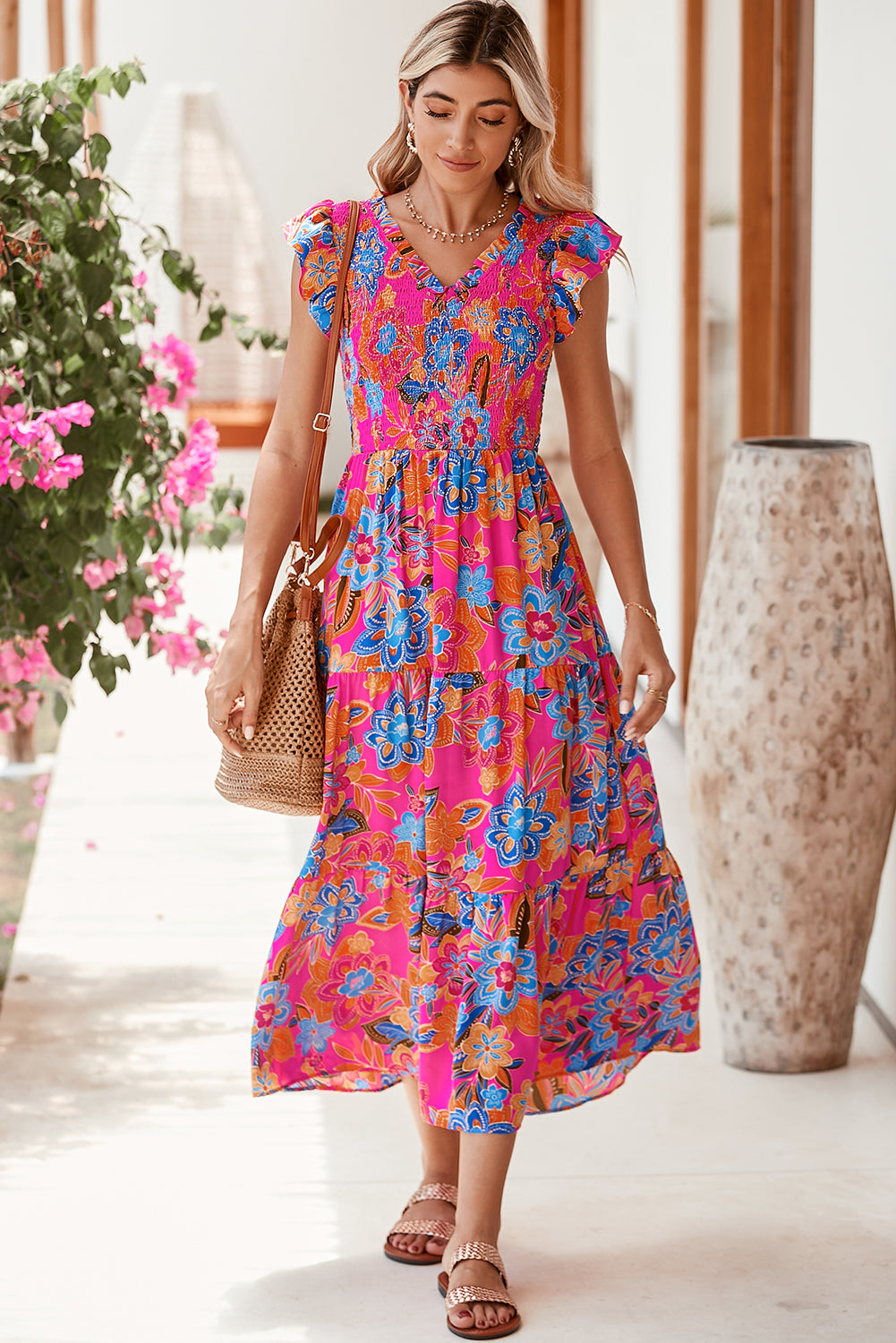 Dark Blue Boho Floral V Neck Ruffle Tiered Long DressMaterial:100%Polyester



		This flirty and fun dress is designed to captivate attention with its stunning floral print. 
	
	
		The smocked bodice and tiered A-