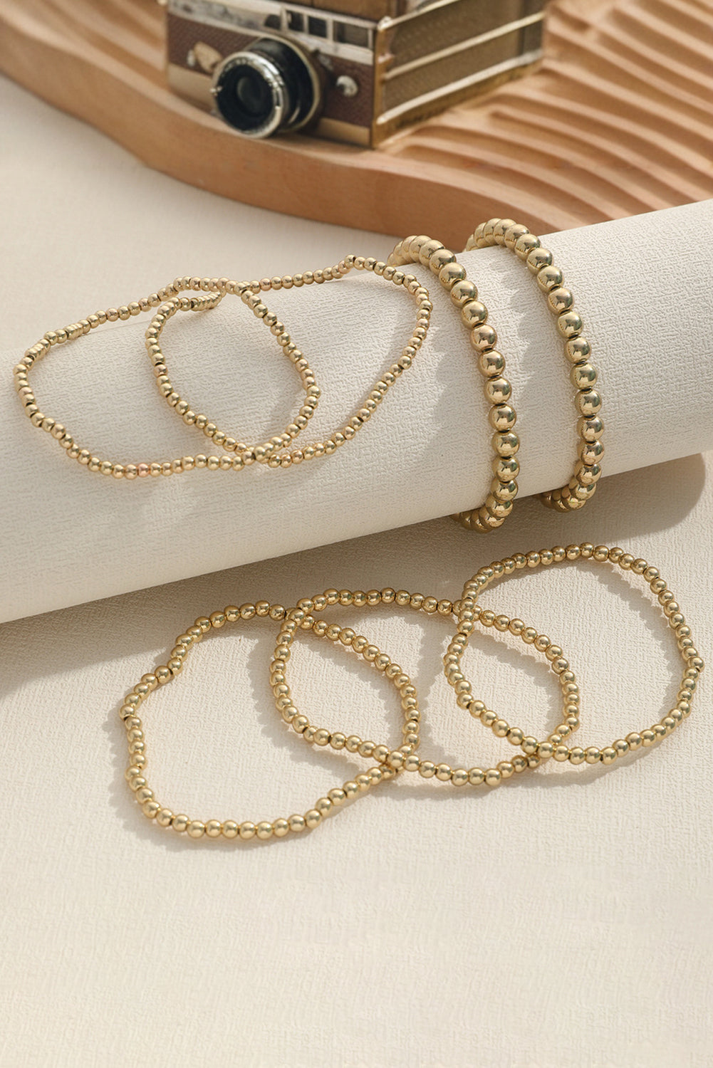 Gold 7pcs Set Minimalist Beaded Luxury Bracelet SetMaterial:100%Alloy

• Elevate your wrist game with this bracelet set, perfect for adding a touch of elegance to any outfit.
• This set includes seven unique bracel