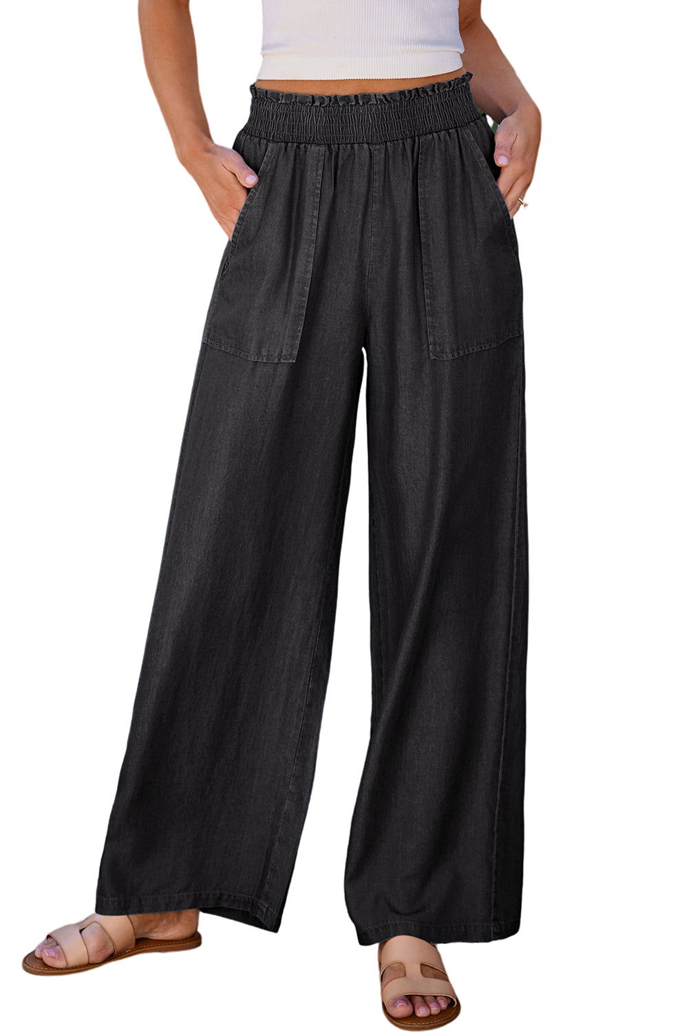 Black Side Pockets Frilled Smocked High Waist Wide Leg JeansMaterial:100%Lyocell

• Embrace a seaside vibe with these jeans featuring side pockets for practicality and frilled detailing for a touch of playful charm.
• Eleva