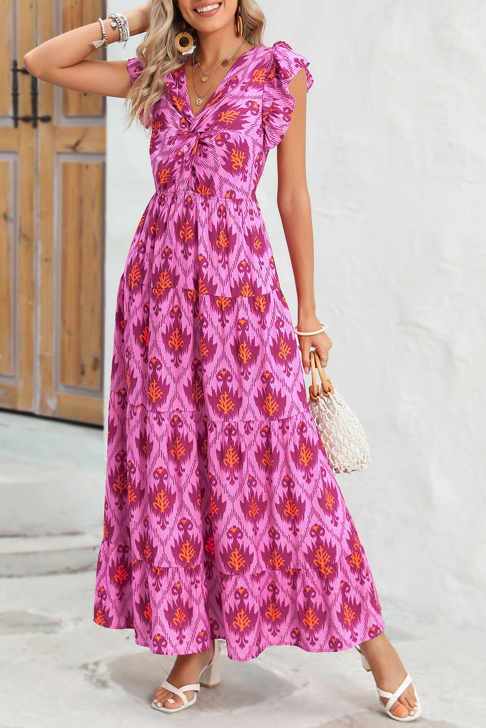 Bonbon Boho Abstract Print Ruffle Tiered Maxi DressMaterial:81%Viscose+19%Polyamide



		The dress embodies a bohemian style, characterized by its free-spirited and relaxed aesthetic. 
	
	
		The maxi length of t