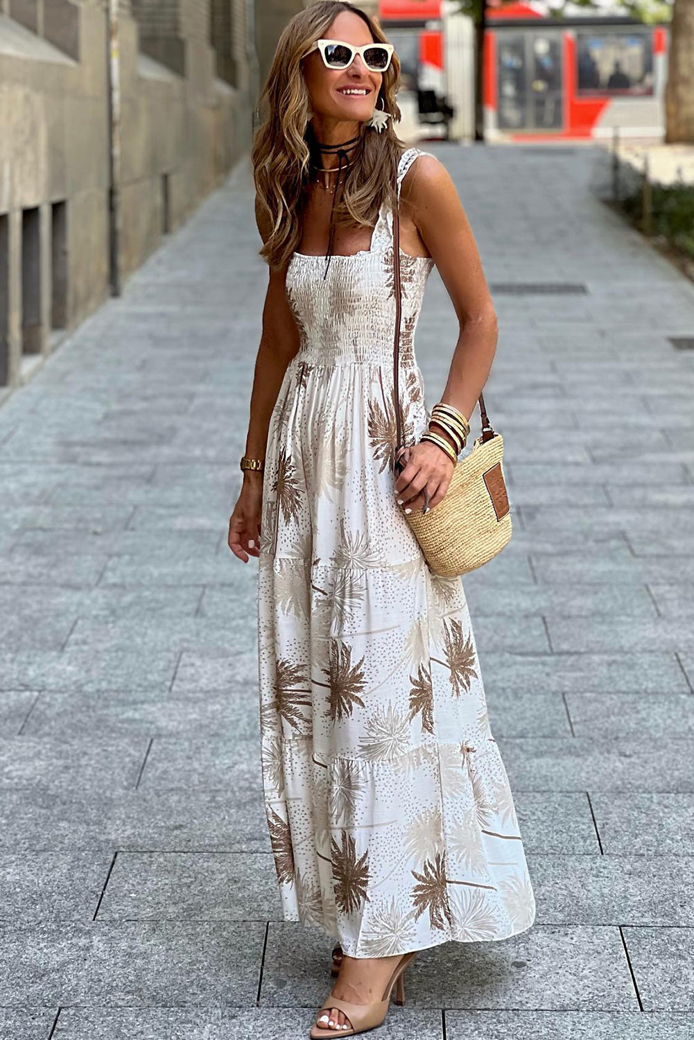 White Tropical Print Smocked Ruffled Straps Maxi DressMaterial:100%Viscose



		The maxi dress is a vibrant and summery dress featuring a tropical print, perfect for adding a pop of color to your wardrobe.
	
	
		Ma