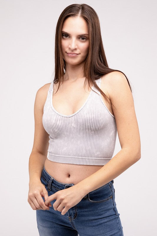 Washed Ribbed Cropped V-Neck Tank TopThe Washed Ribbed Cropped V-Neck Tank Top offers a stylish and comfortable option for your wardrobe. Made from ribbed fabric with a washed finish, it exudes a casual