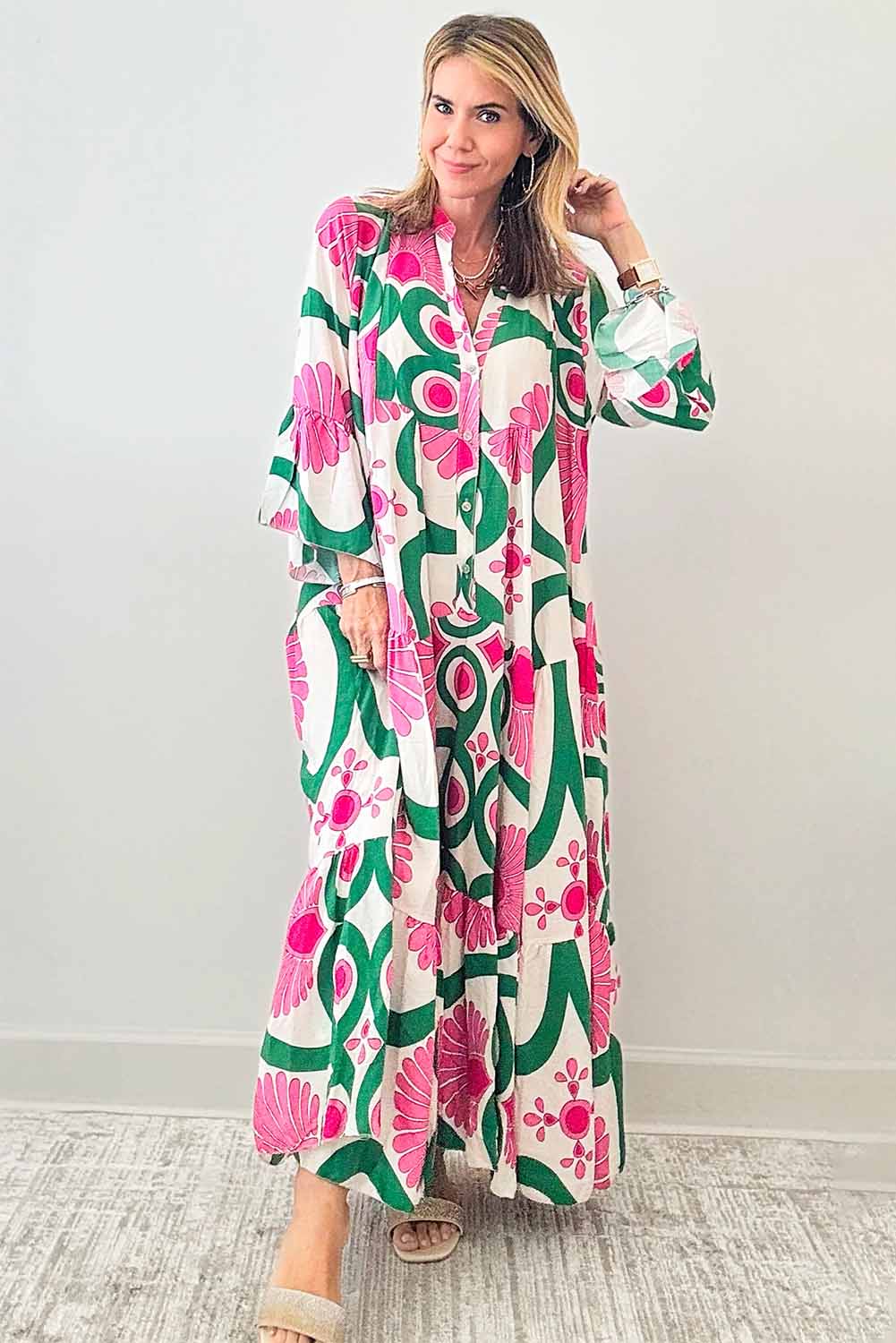 Pink Boho Abstract Button V Neck Oversized Maxi DressMaterial:100%Polyester

• Embrace your inner free spirit with our maxi dress, featuring a stunning abstract pattern and bell sleeves that exude bohemian charm. 
• 