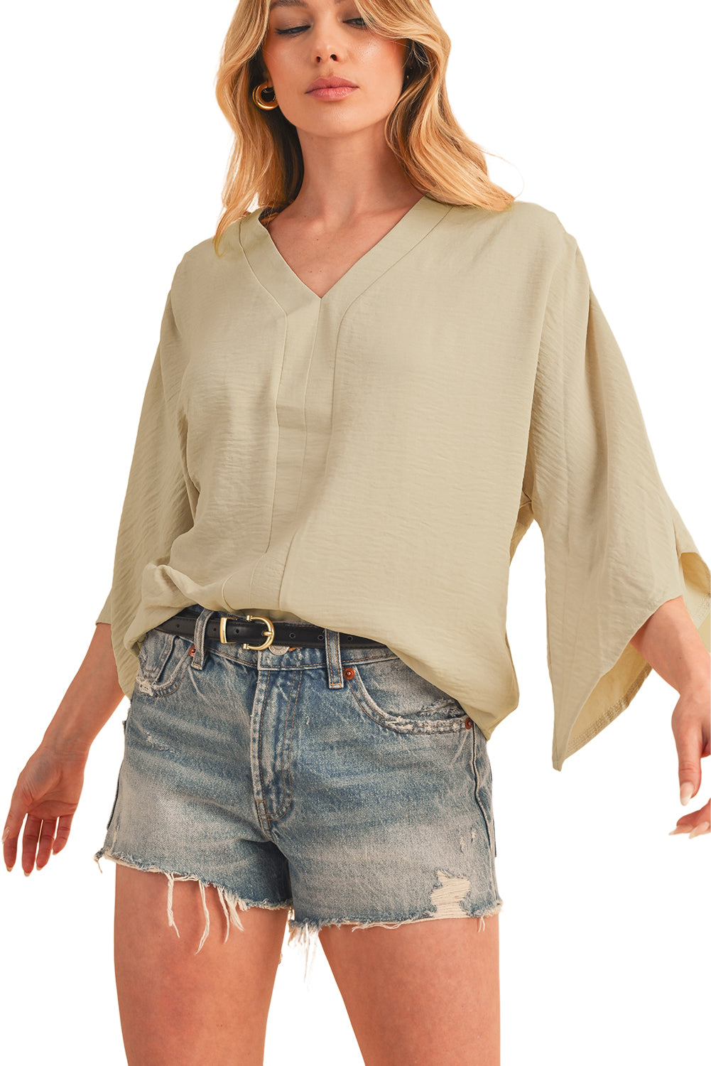 Parchment Solid Color Crinkled V Neck Ruffled Sleeve BlouseMaterial:100%Polyester



		The blouse comes in a solid color, which provides a clean and versatile look. 
	
	
		The crinkled effect also makes the blouse resis