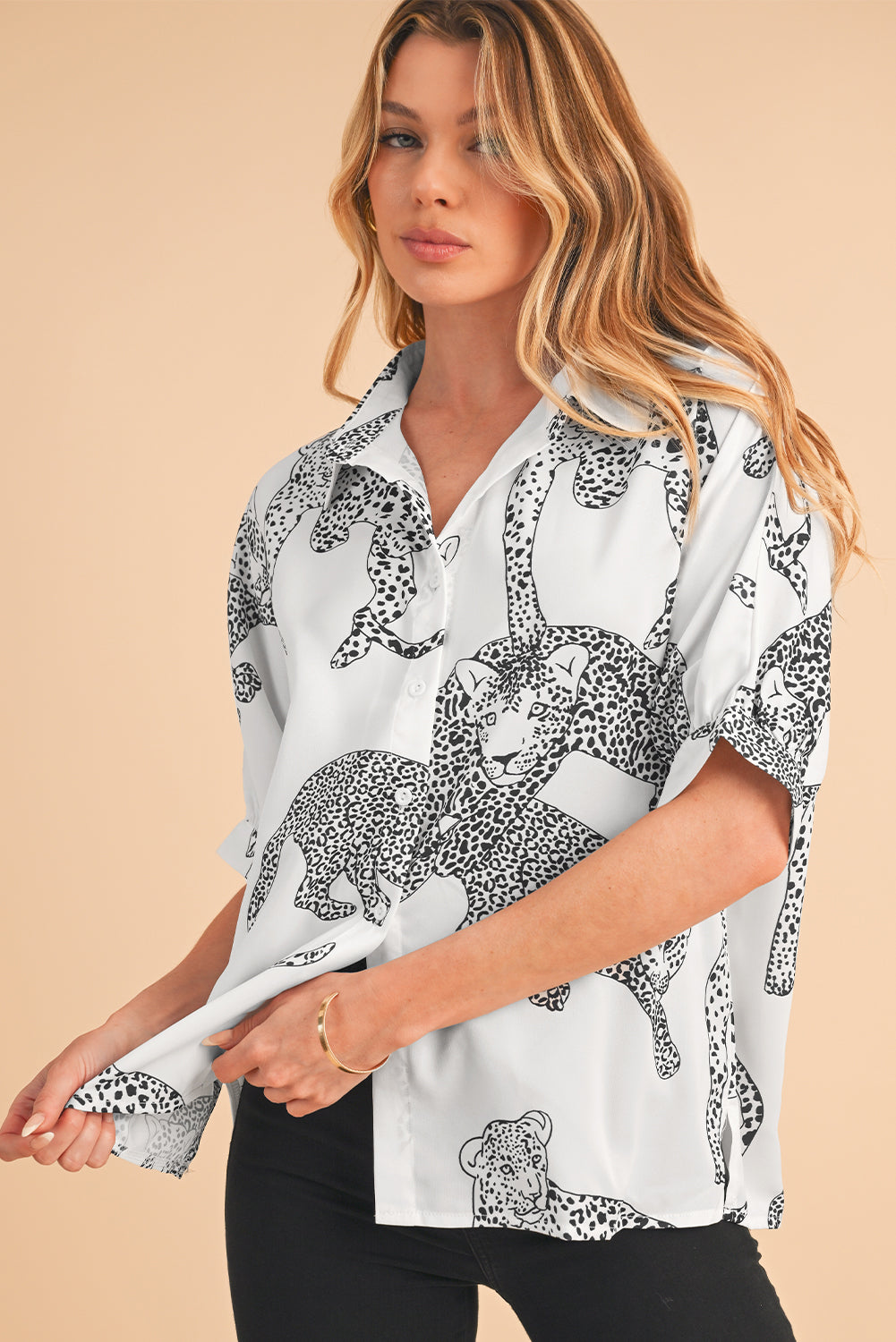 Beige Cheetah Print Buttoned Half Sleeve BlouseMaterial:100%Polyester



		The blouse features a trendy and eye-catching cheetah print pattern, adding a bold and stylish touch to your outfit.
	
	
		Made from