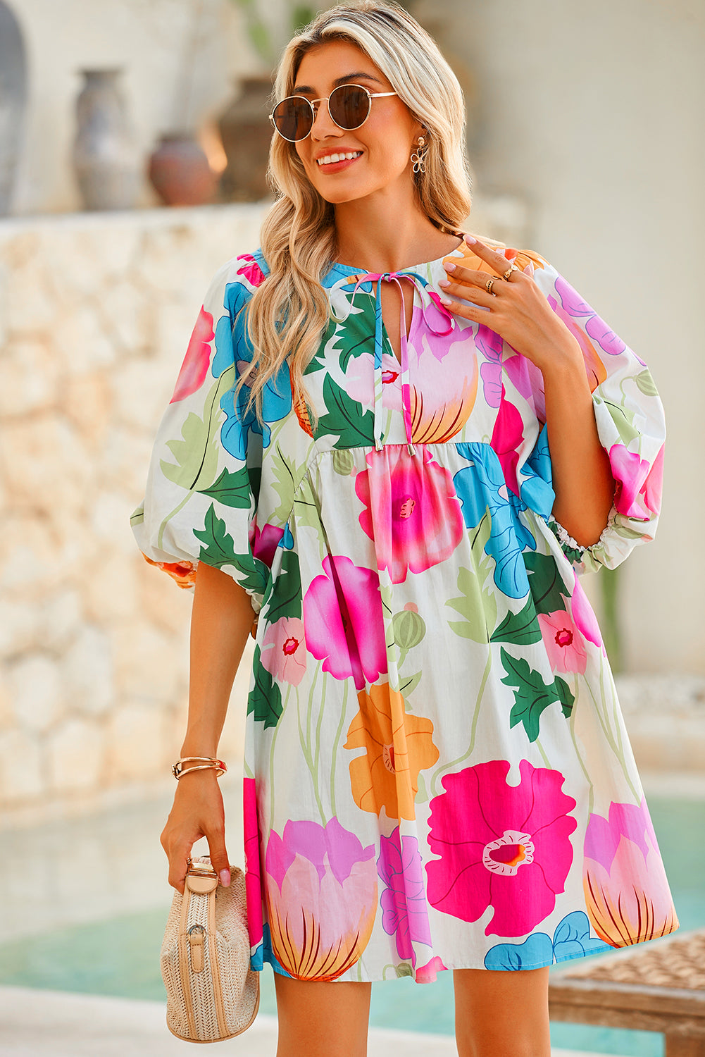 White Puff Sleeve Tied Split Neck Colorful Floral Flowy DressMaterial:100%Cotton


	


		Step into elegance with our mini dress, a vibrant and feminine piece designed to make a statement.
	
	
		This dress features charm